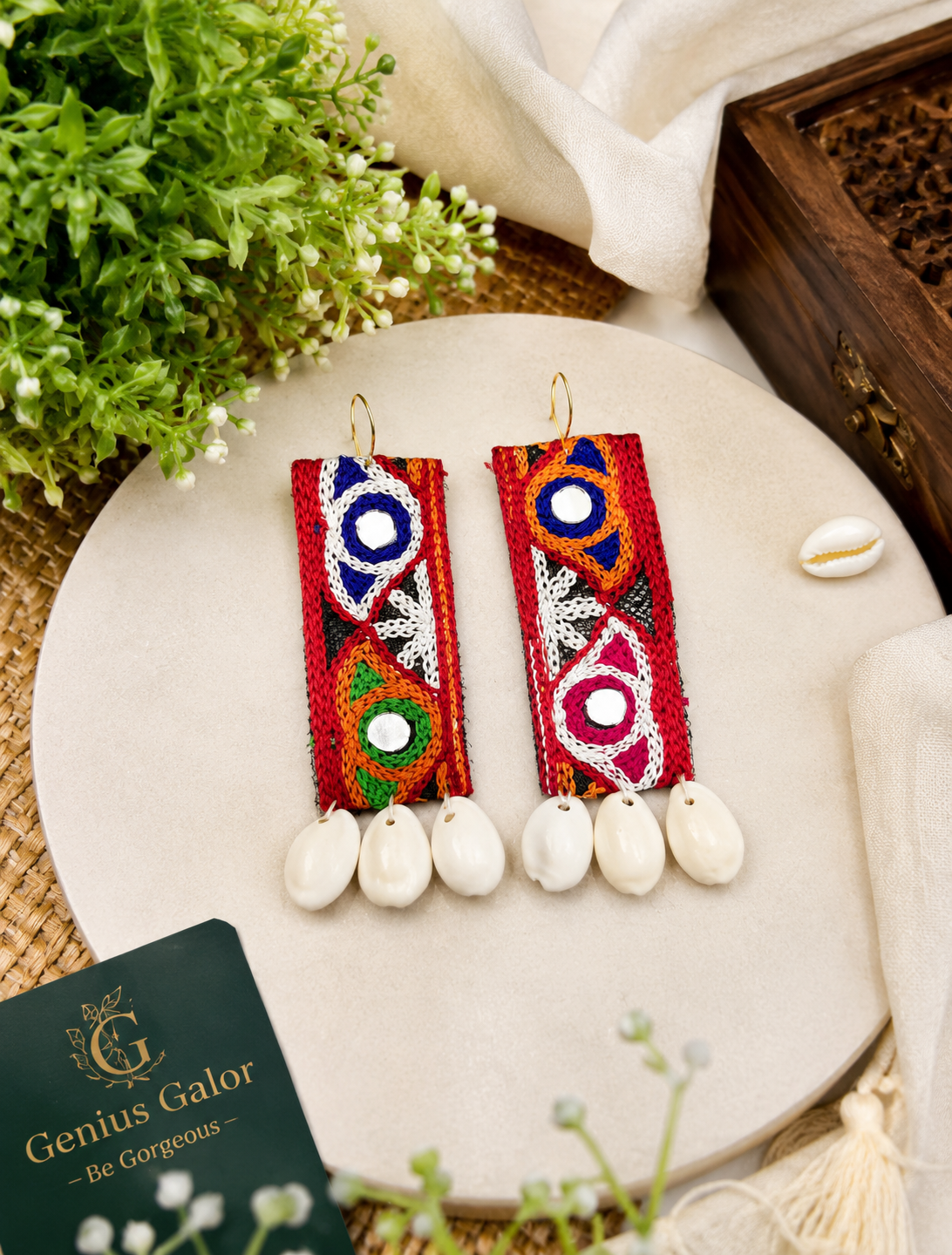 Earrings with cowrie Shell